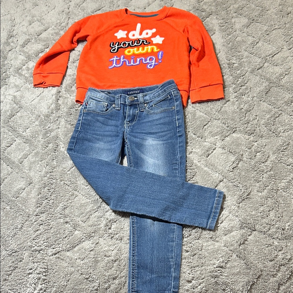 Vigors Blue Jeans and Orange Sweatshirt